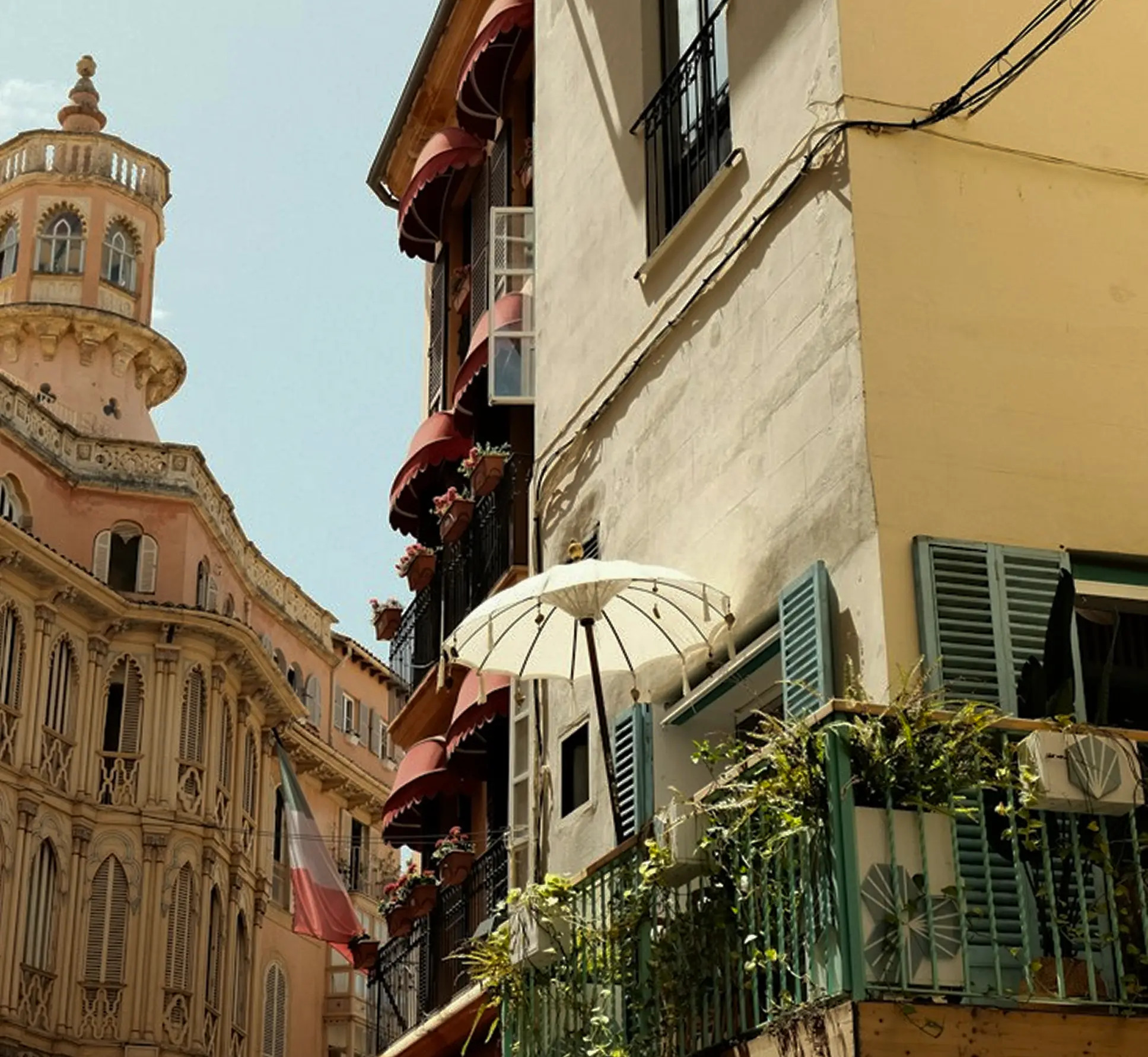 Palma de Mallorca streetscape with ornate balconies and blue sky